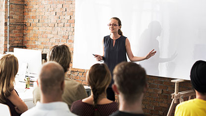 Instructor addressing classroom training session